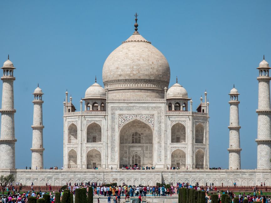 incredible india campaign — A captivating view of the Taj Mahal under a clear blue sky, showcasing its iconic architectu